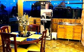 Romántica Cabaña con vista a la ciudad, 10 min del Centro